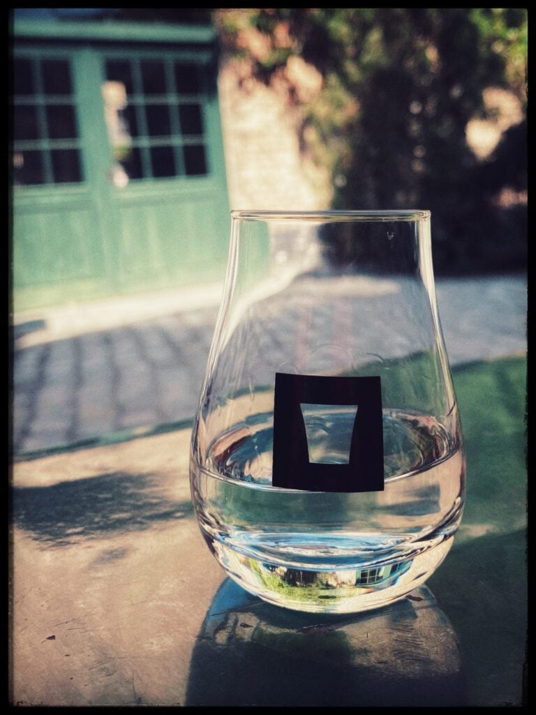 Image of a glass of Jenever on a table