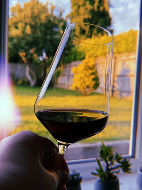 Image of a glass of red wine