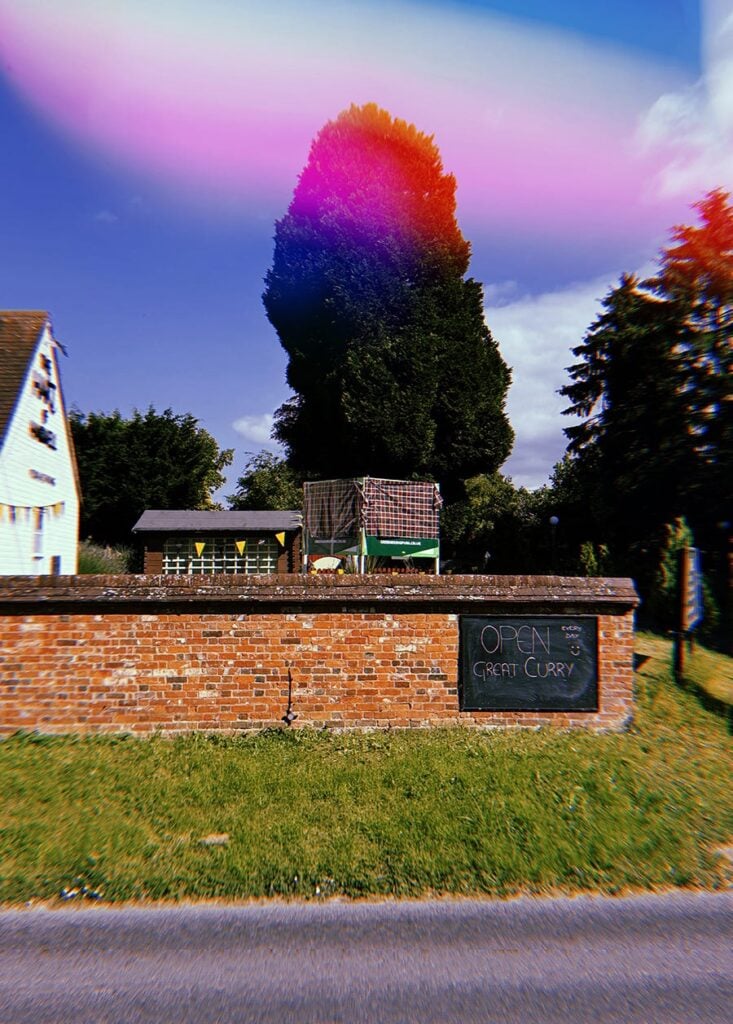 Image of a pub exterior and beer garden