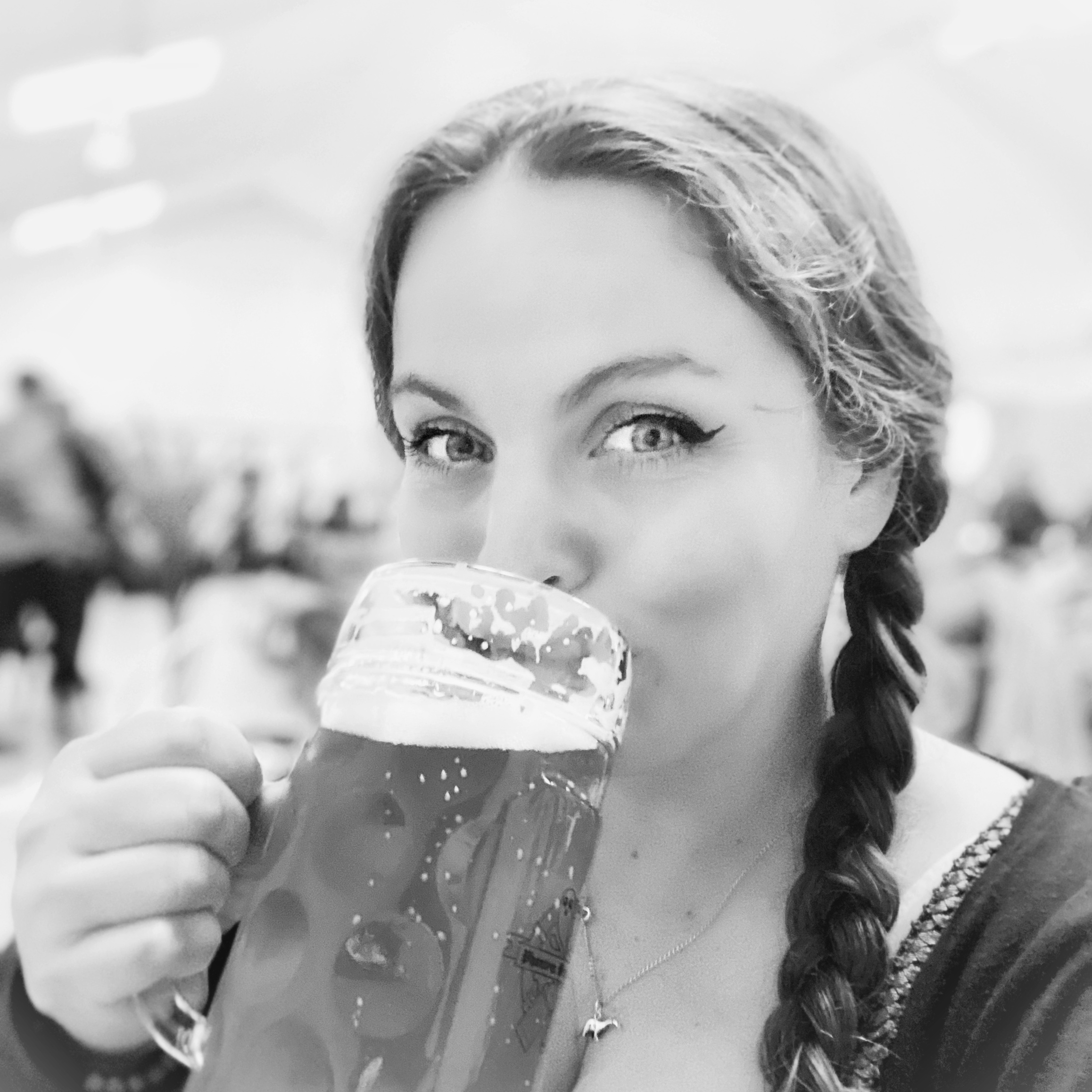 Image of person drinking beer