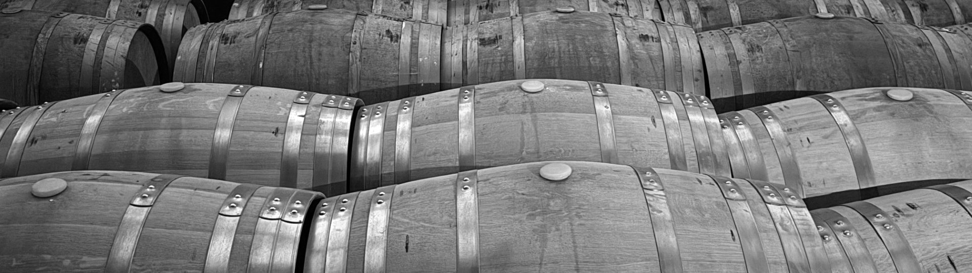 Image of wine barrels in a cellar