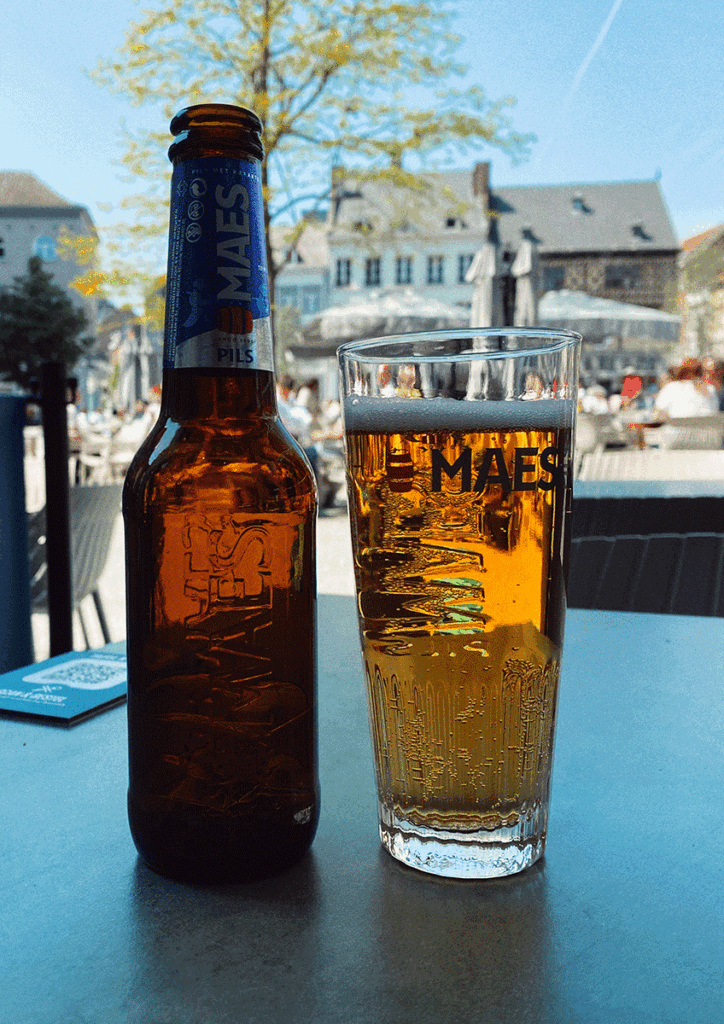 Image of a Maes Pils bottle and glass